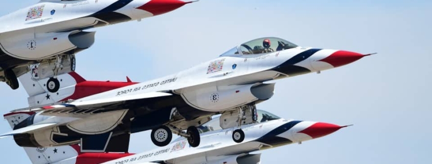 Three fighter jets taking off