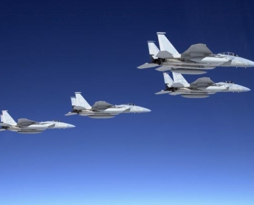 Four fighter jets in formation