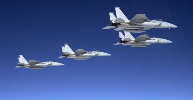 Four fighter jets in formation