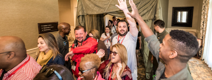 Audience Reaction, Man Giving High Fives In Hallway