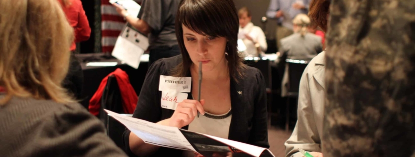 Woman carefully studying paperwork