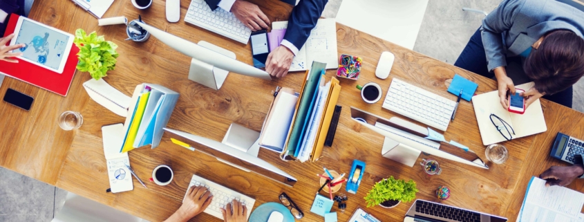 Employees working at the same table