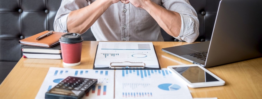Stock image of employee sitting at desk