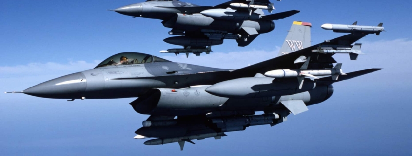 Two fighter jets flying in the air