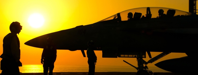 Cockpit with sun setting behind it