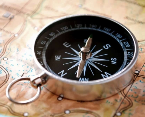 Image of compass on a map