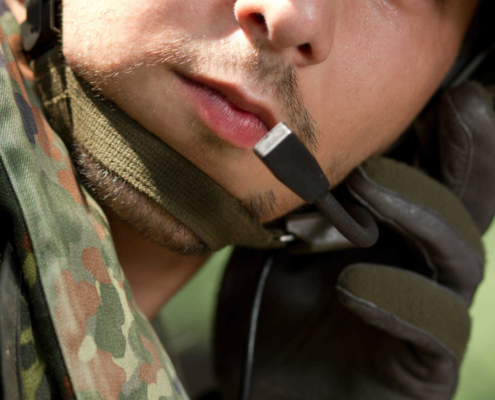 Closeup of soldier wearing head set