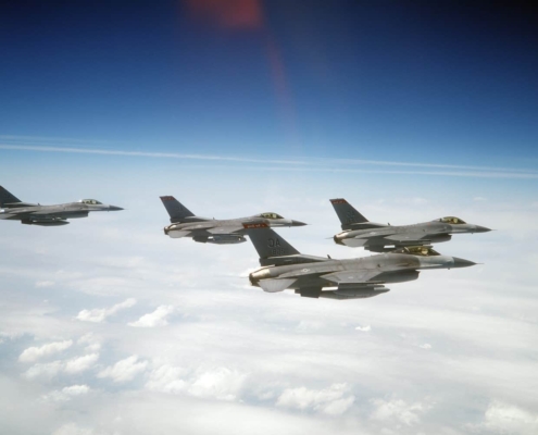 Four fighter jets in the air