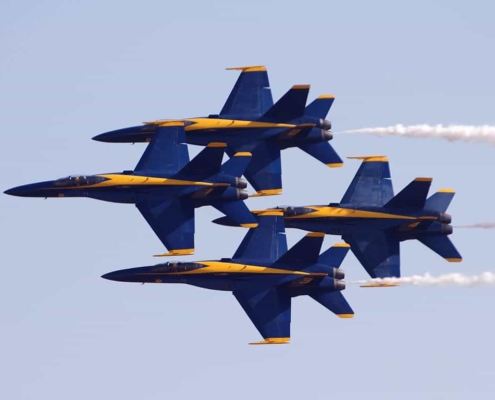 Four blue angel airplanes