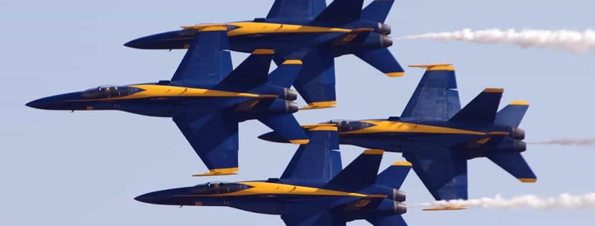 Four blue angel airplanes