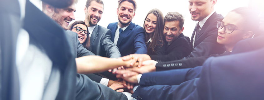 Team huddling together