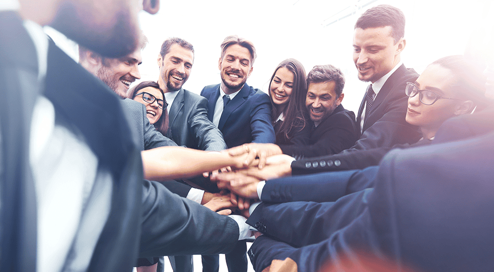 Employees getting ready to start the day with a huddle