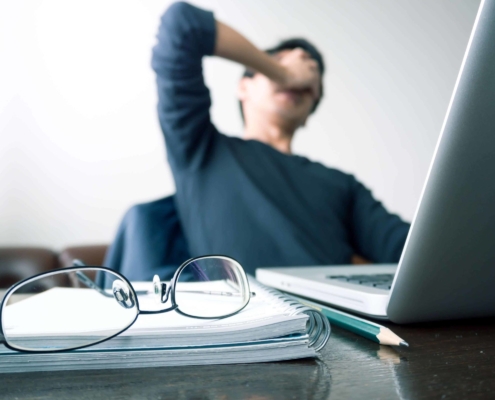 Man stressed sitting at his desk