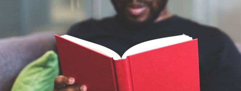 Man taking time to read a book