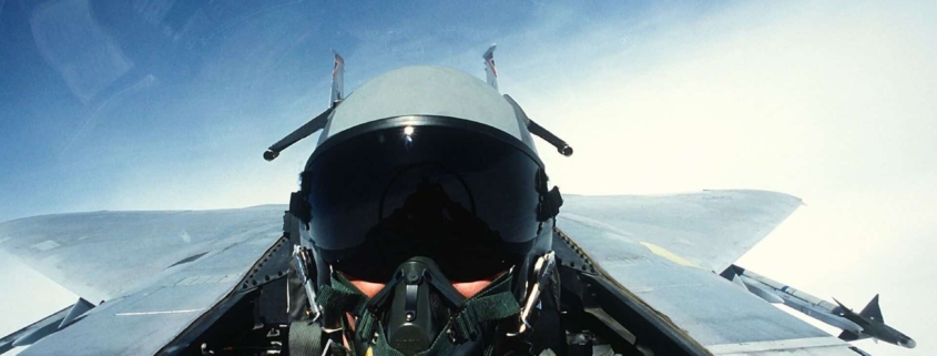 Face of fighter pilot in cockpit