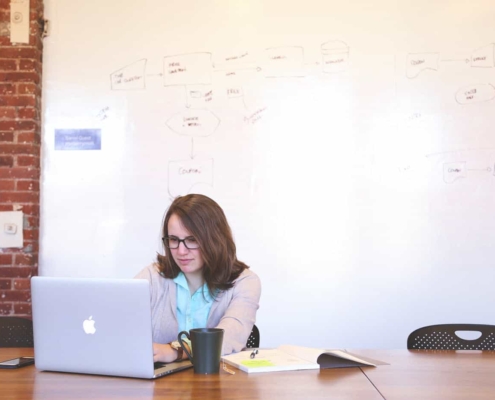 Woman working on laptop in the office