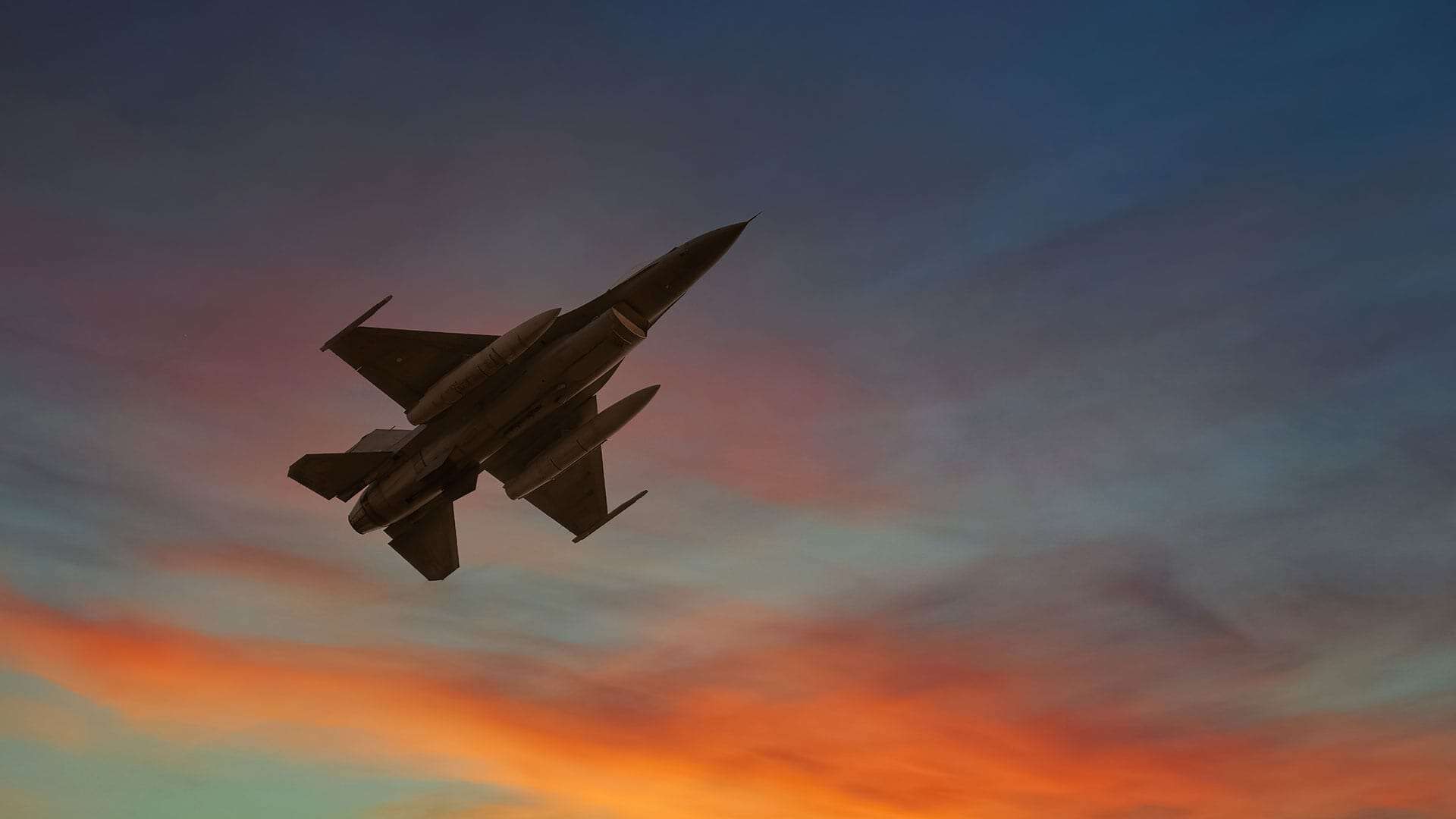 Fighter jet flying in the sky alone