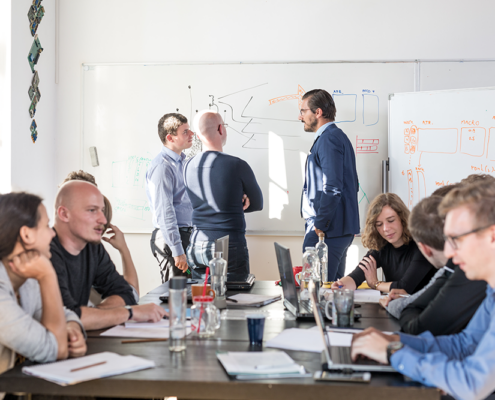Team leaders brainstorming with employees
