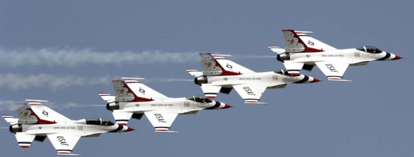 Four fighter jets flying together