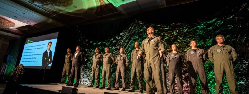 Afterburner team inspiring employees on stage