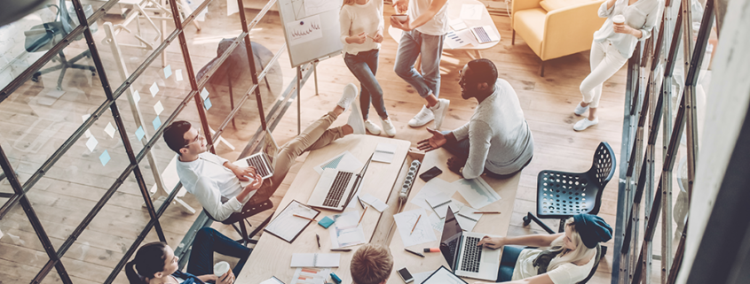 Young workers together in a room