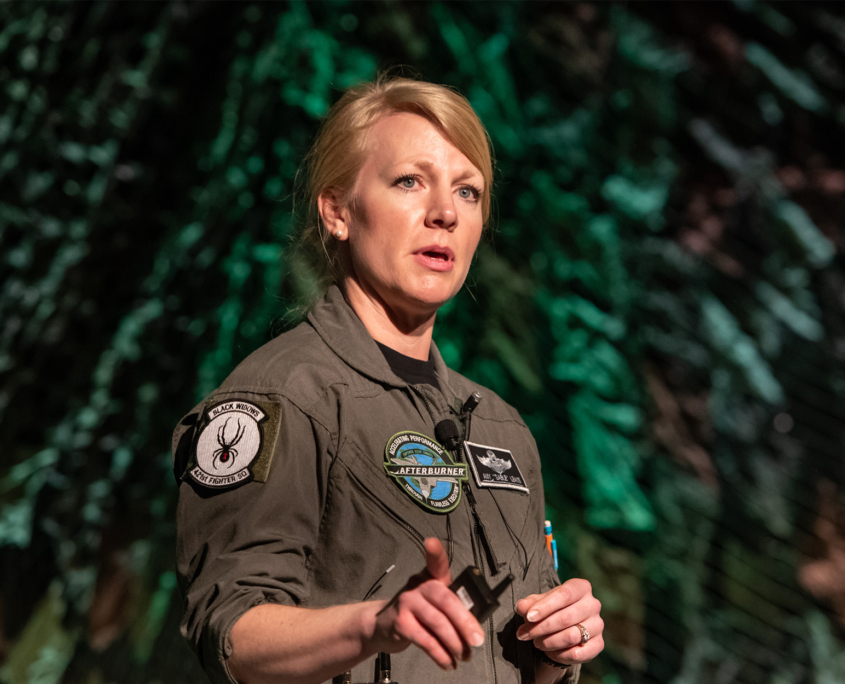 Close Up Of Female Speaker On Stage At Keynote