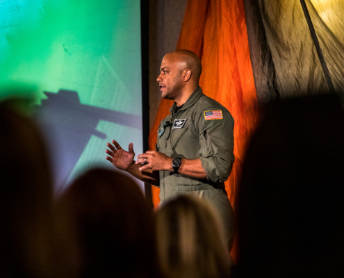 Front View Of Afterburner Pilot Giving Speech