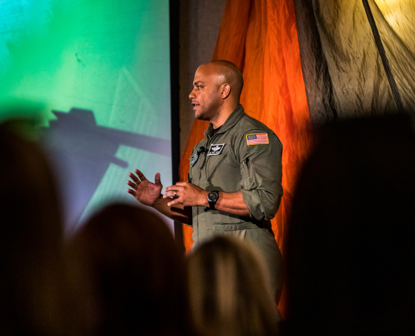 Front View Of Afterburner Pilot Giving Speech
