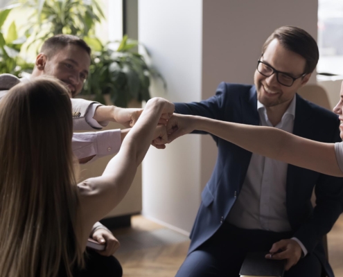 Business People Putting Hands Together
