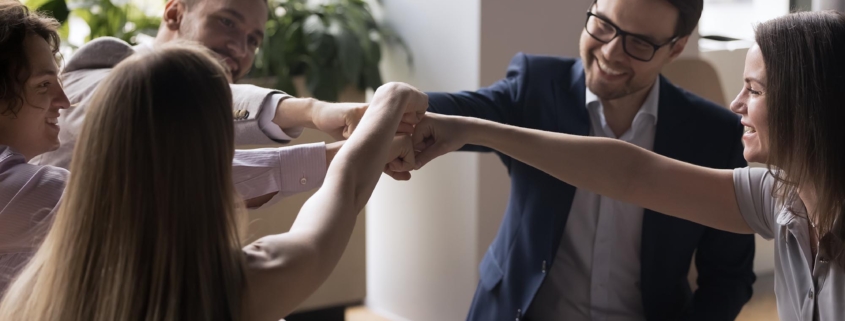 Business People Putting Hands Together