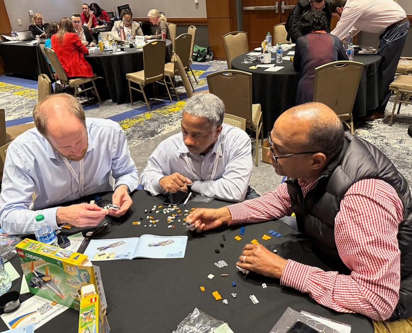 Participants Federal Reserve Working On Lego Exercise 2