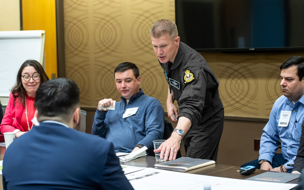 Participants Stj Stryker Pointing At Checklist Black Suit