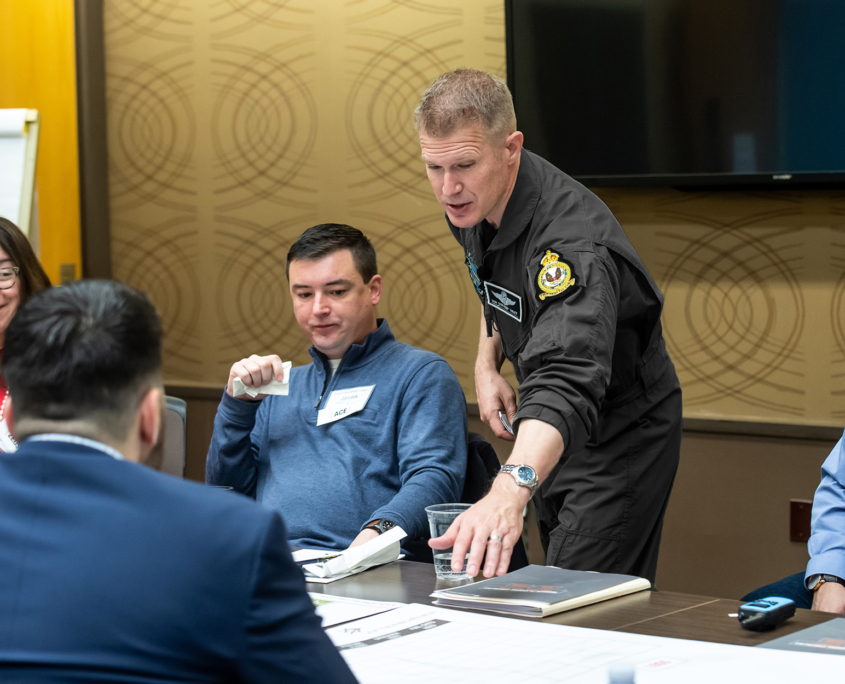 Participants Stj Stryker Pointing At Checklist Black Suit