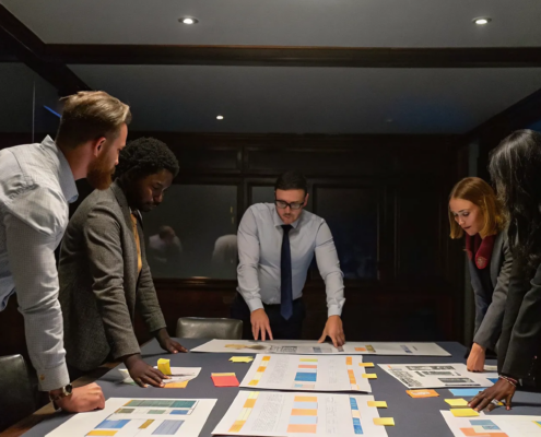 Business team in a strategic alignment workshop collaborating on company goals and priorities.