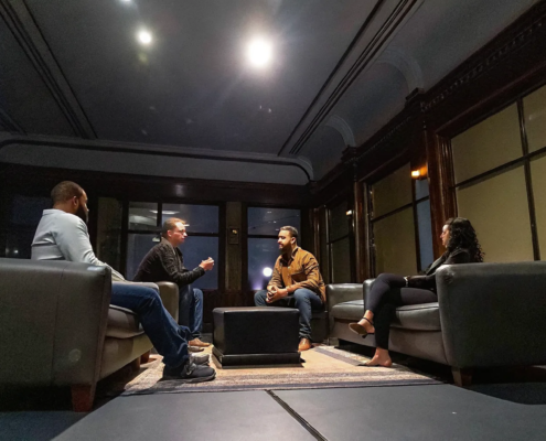 Enterprise leaders conducting a candid performance debrief